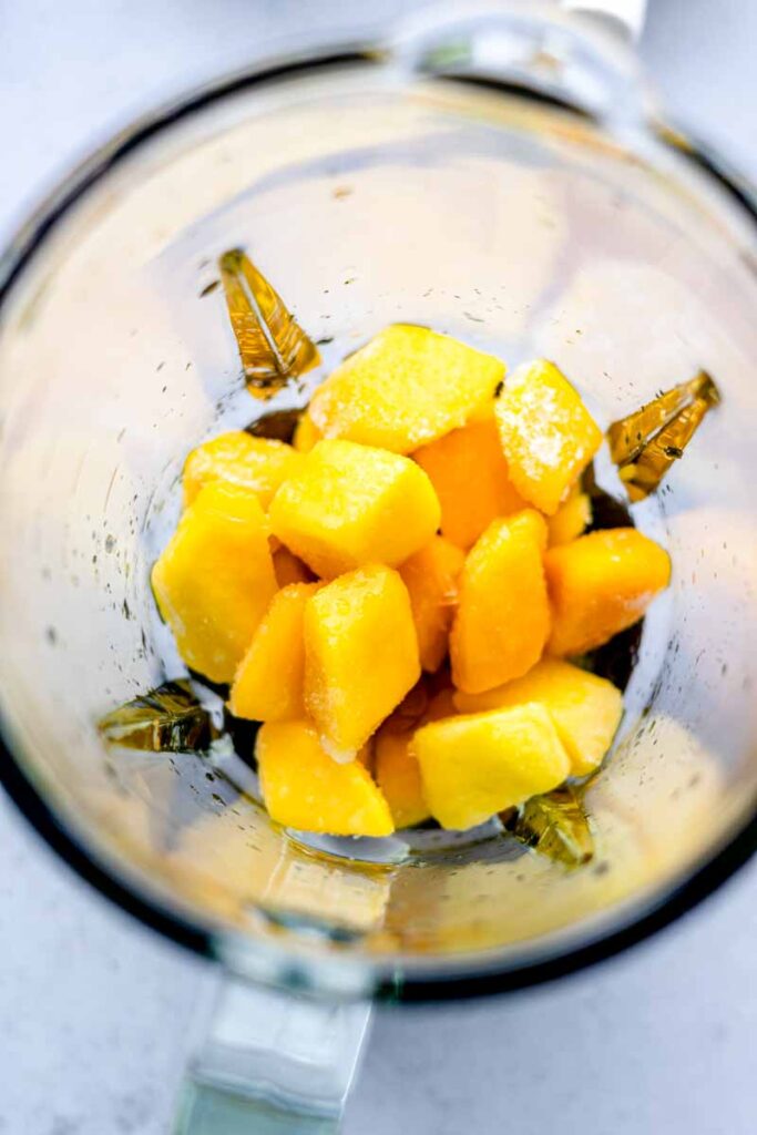 mango chunks, lime juice and honey in blender