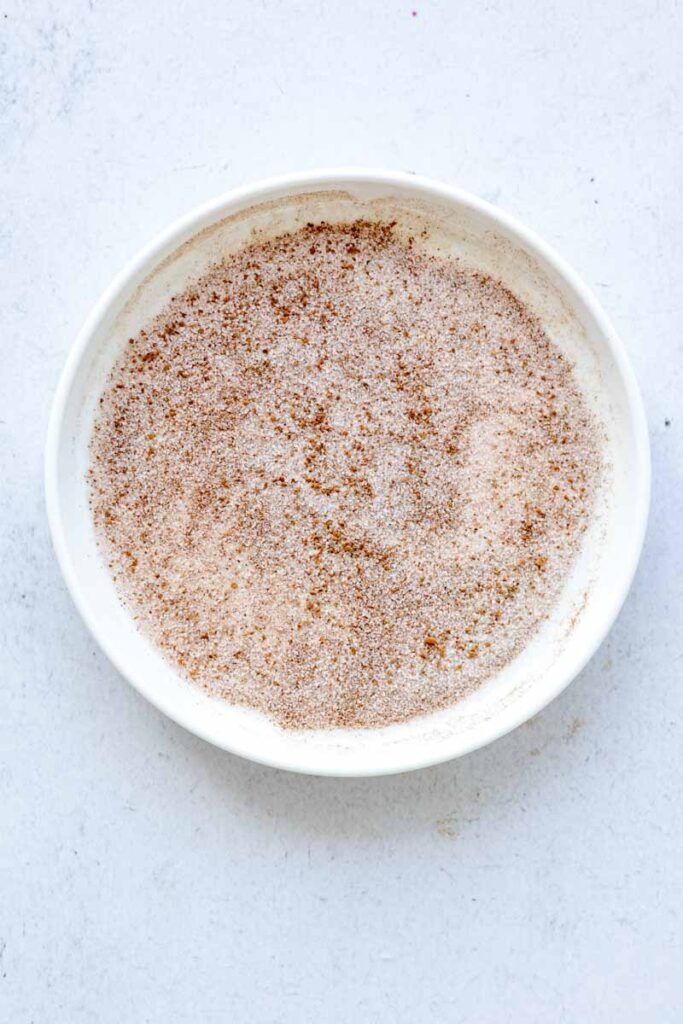 a plate of cinnamon powder mixed with white sugar