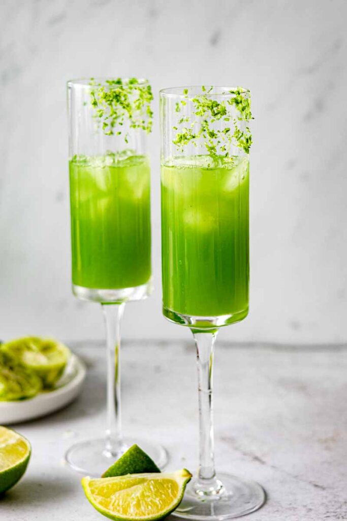 cucumber lime juice in tall champagne glasses