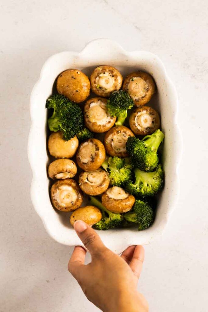 broccoli and mushrooms in a baking dish