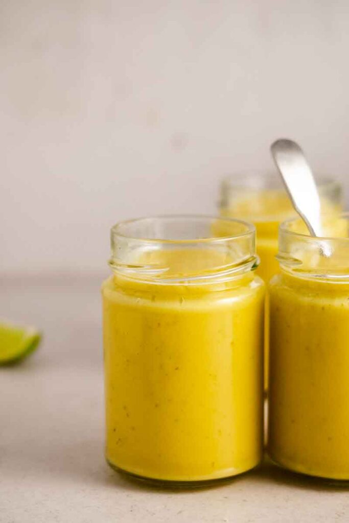 two jars of pear mango smoothie