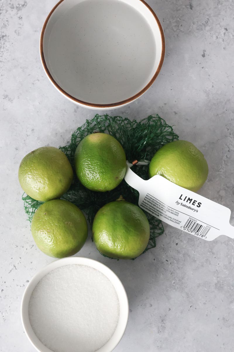lime, water and sugar on a table