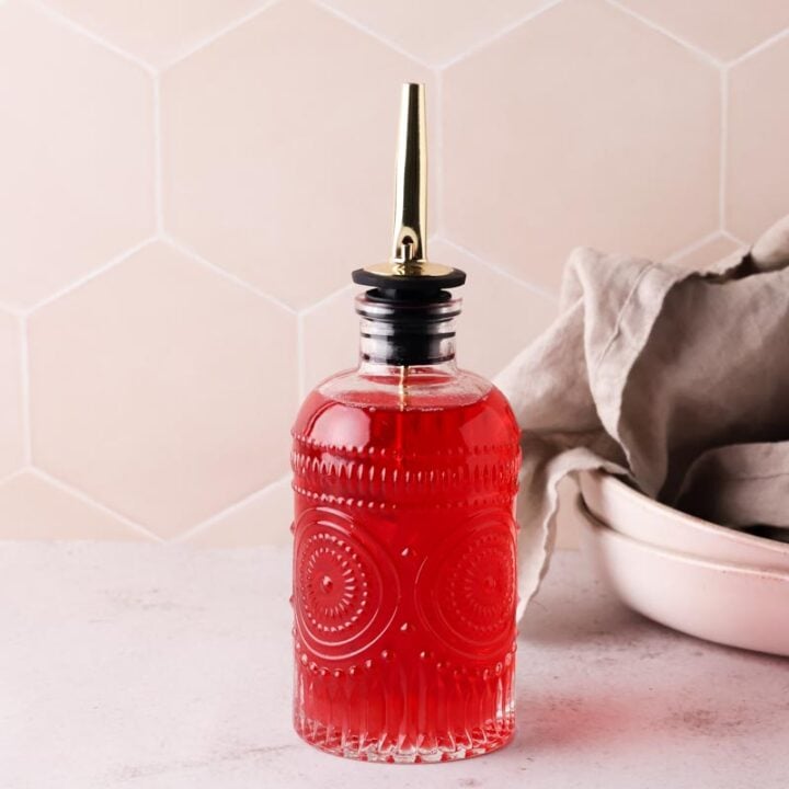 raspberry syrup in a syrup bottle